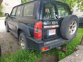 Nissan Patrol 2009 г Внедорожник / Кроссовер