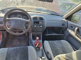 Mazda 323F 1999 г запчясти