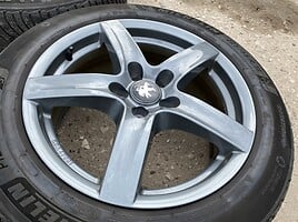 Peugeot Siunciam, 8J ET45 light alloy R18 rims