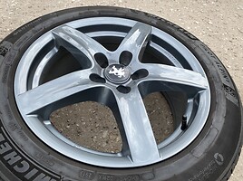 Peugeot Siunciam, 8J ET45 light alloy R18 rims