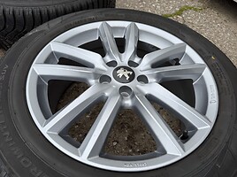 Peugeot Siunciam, 7,5J ET50 light alloy R18 rims