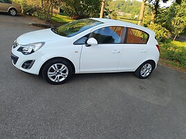 Opel Corsa 2013 г Хэтчбек