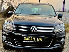 Volkswagen Tiguan 2013 г Внедорожник / Кроссовер