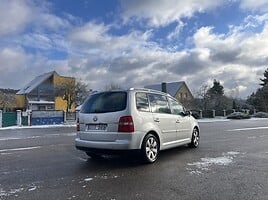 Volkswagen Tiguan 2006 г Минивэн