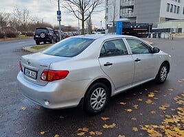 Toyota Corolla 2009 г Седан