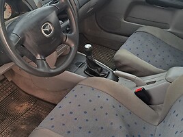 Mazda 323F 2003 г запчясти