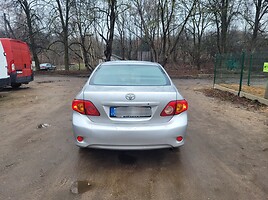 Toyota Corolla 2010 г Седан