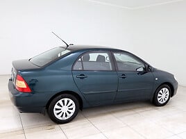 Toyota Corolla 2004 г Седан