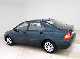 Toyota Corolla 2004 г Седан