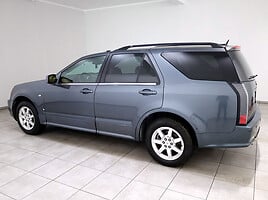 Cadillac SRX 2008 y Van