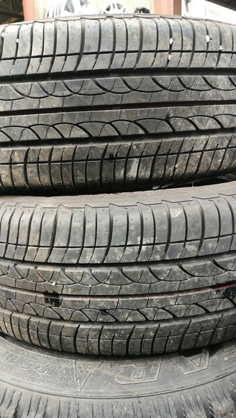 Фотография 1 - Bridgestone R15 летние шины для автомобилей