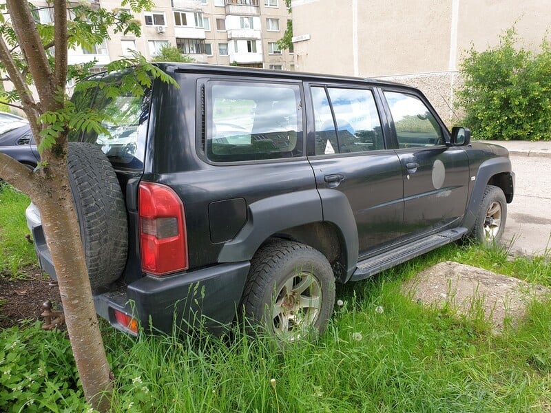 Фотография 3 - Nissan Patrol 2009 г Внедорожник / Кроссовер