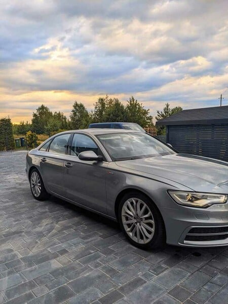 Audi A6 TFSI Quattro S troni 2012 г