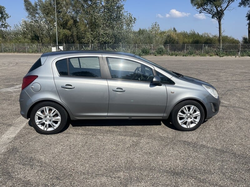 Фотография 8 - Opel Corsa D CDTI Enjoy 2011 г