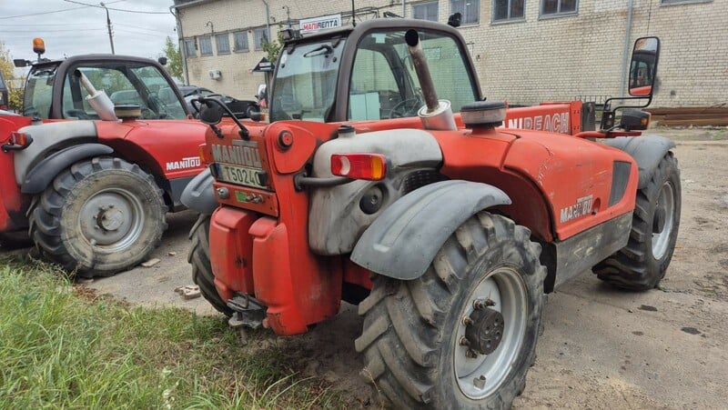 Photo 4 - Manitou 1999 y Loader