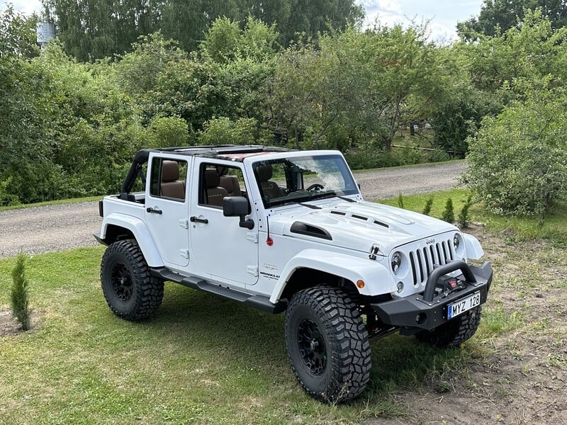 Фотография 7 - Jeep Wrangler 13105 2014 г