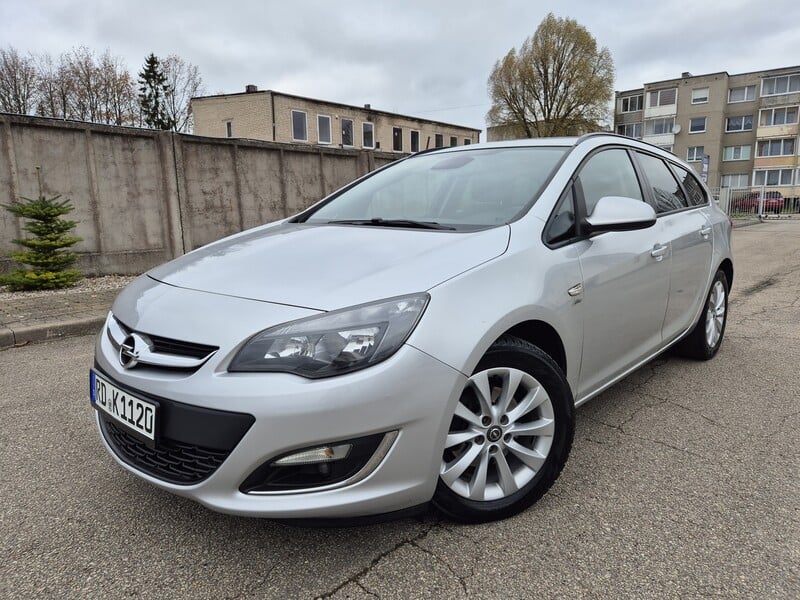 Фотография 1 - Opel Astra 2013 г Универсал