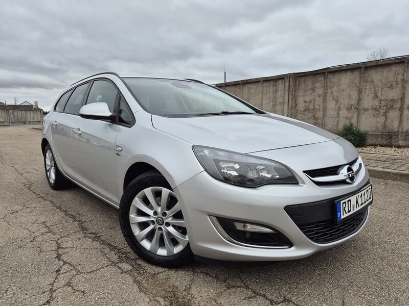 Фотография 6 - Opel Astra 2013 г Универсал