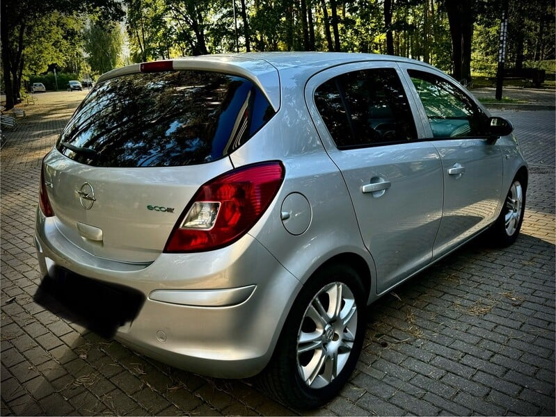 Фотография 24 - Opel Corsa D 2010 г