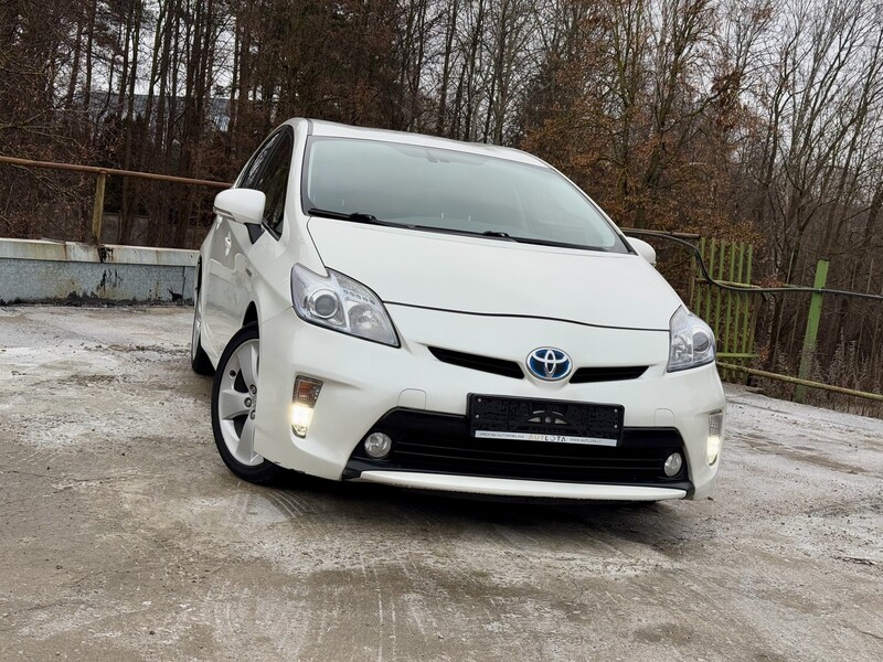 Фотография 11 - Toyota Prius Hybrid Prestige 2012 г