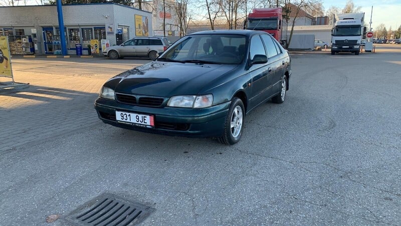 Фотография 1 - Toyota Carina 1997 г Седан