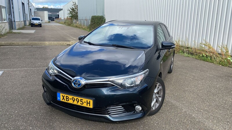 Фотография 26 - Toyota Auris Hybrid Comfort 2015 г