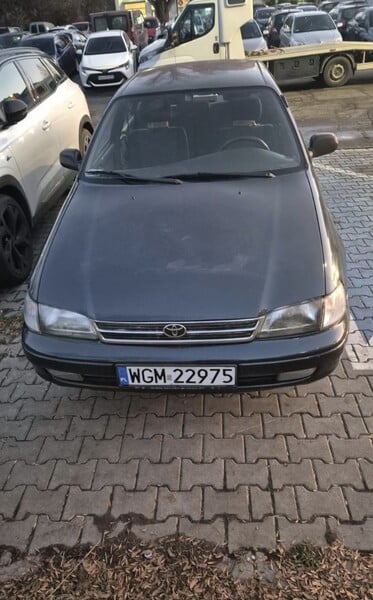 Фотография 1 - Toyota Carina 1995 г Седан