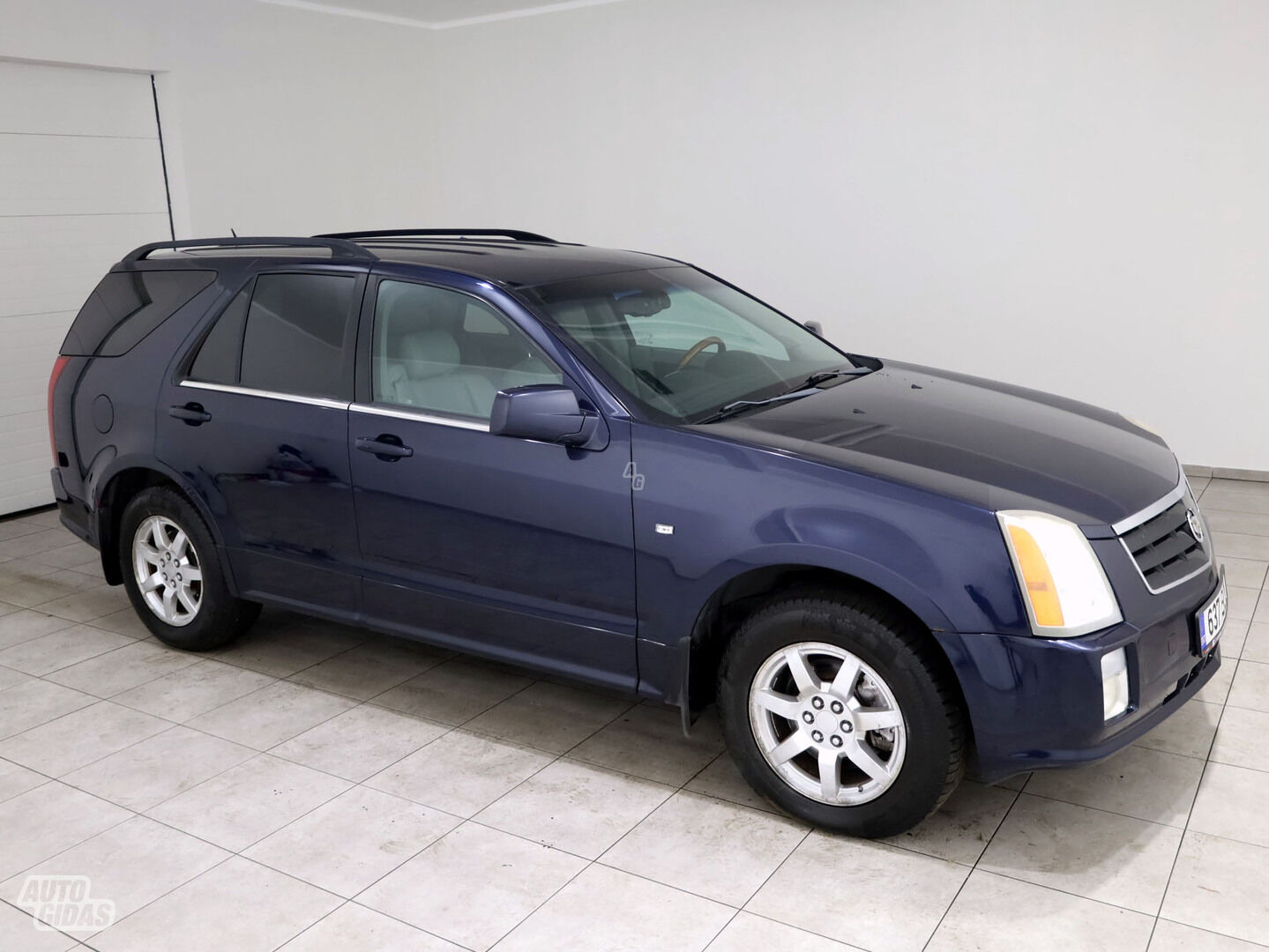 Cadillac SRX 2006 y Van