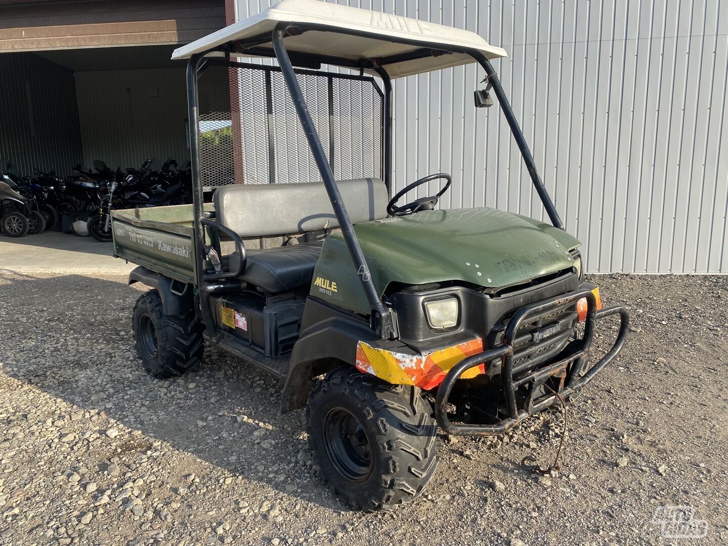 Kawasaki Mule 2011 г Четырех мотоцикл