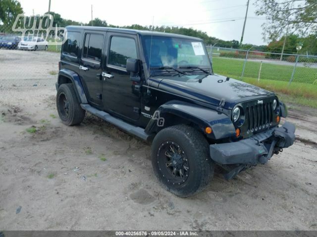 Jeep Wrangler 2011 г Внедорожник / Кроссовер