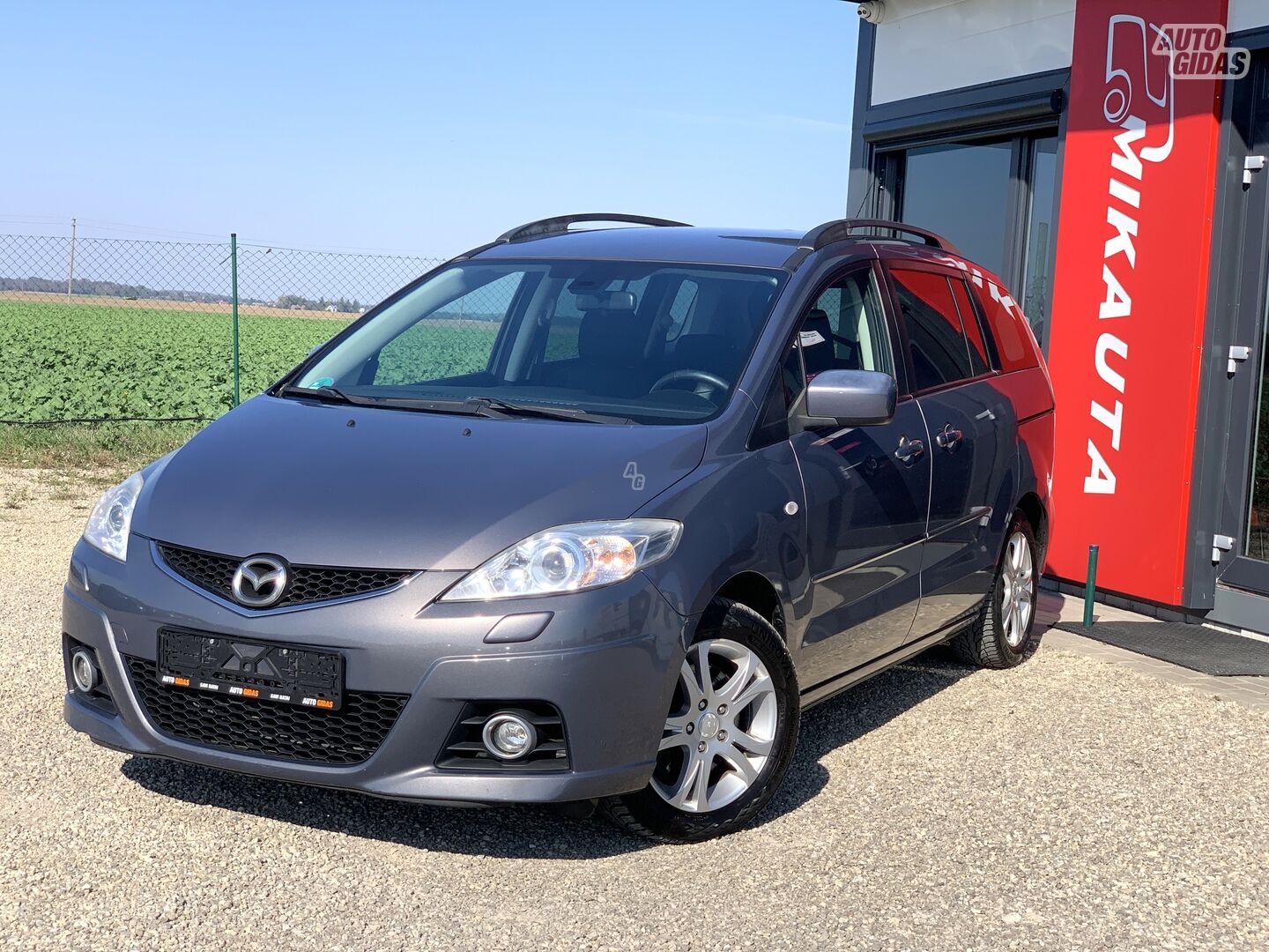 Mazda 5 2009 г Минивэн