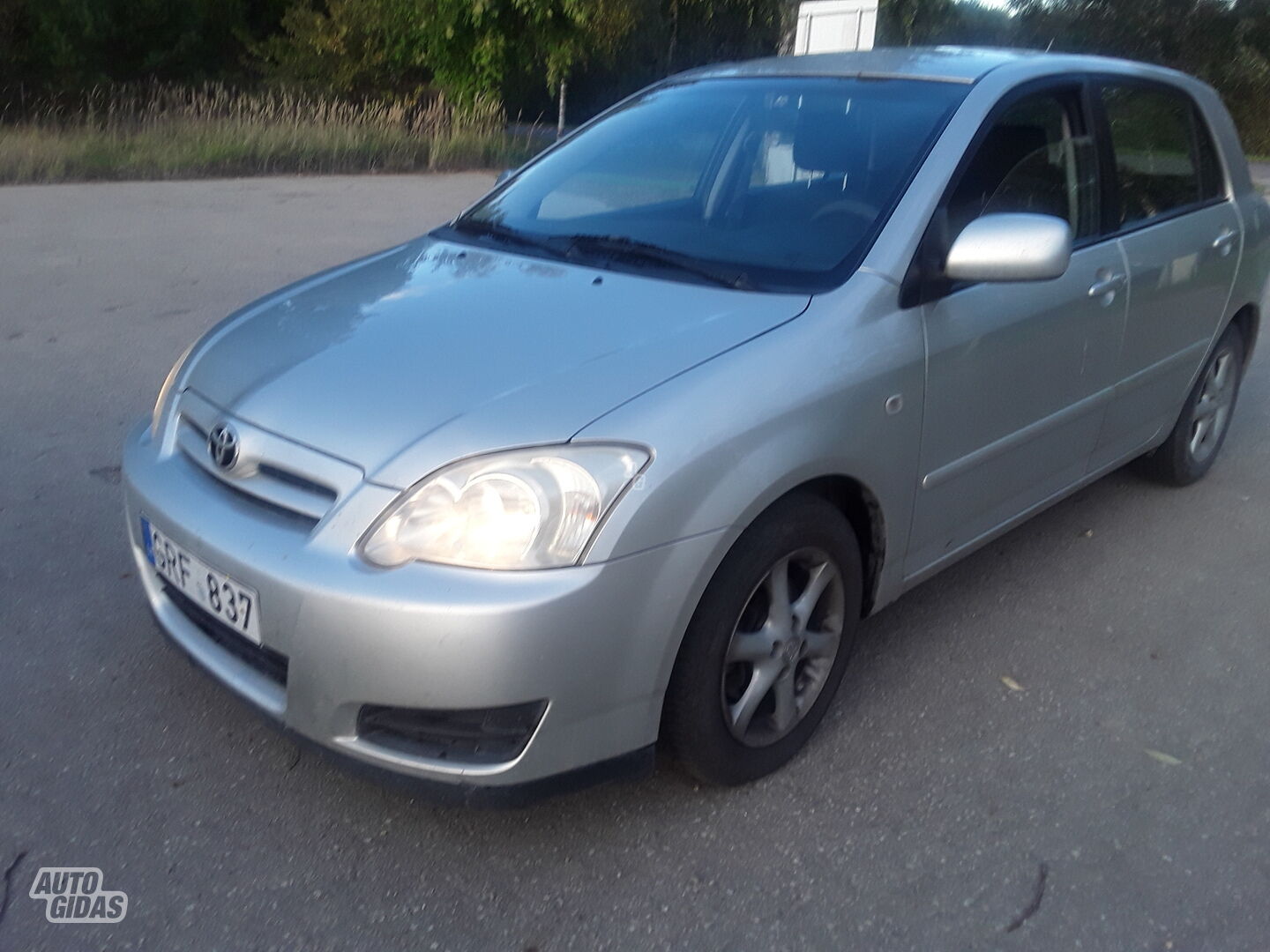 Toyota Corolla 2004 г Седан