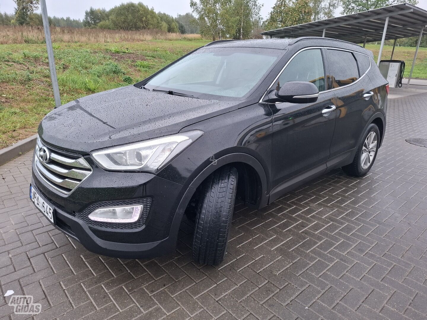 Hyundai Santa Fe III 2015 y