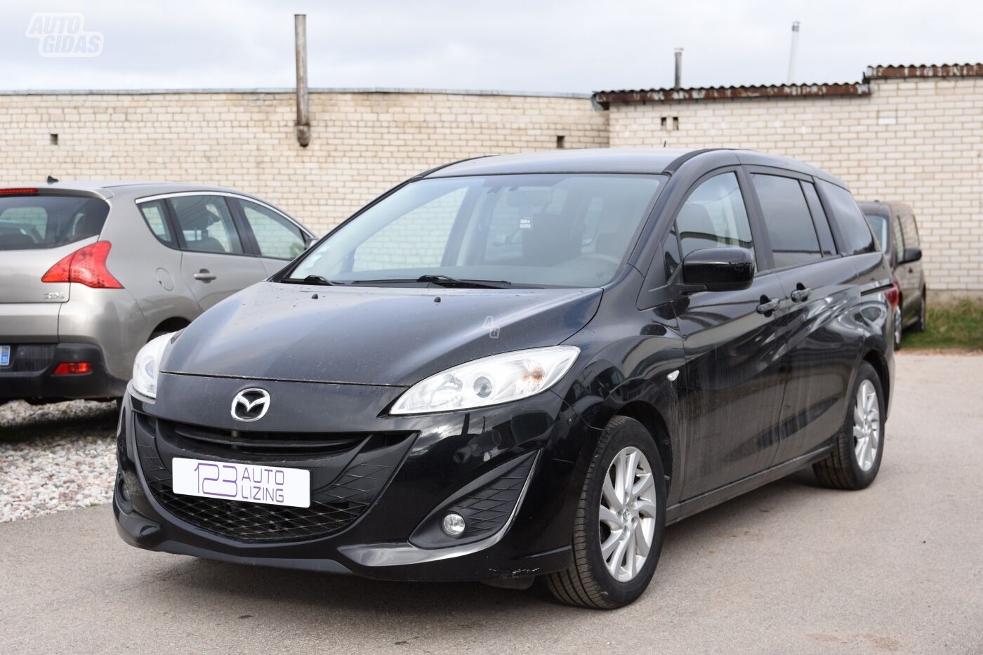 Mazda 5 2011 y Van