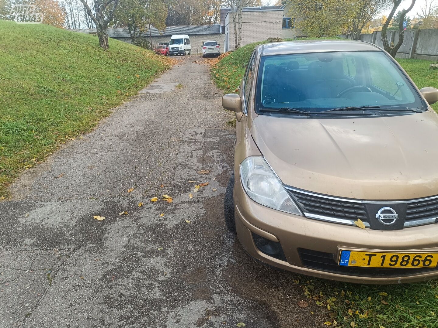 Nissan Tiida 2009 г Седан