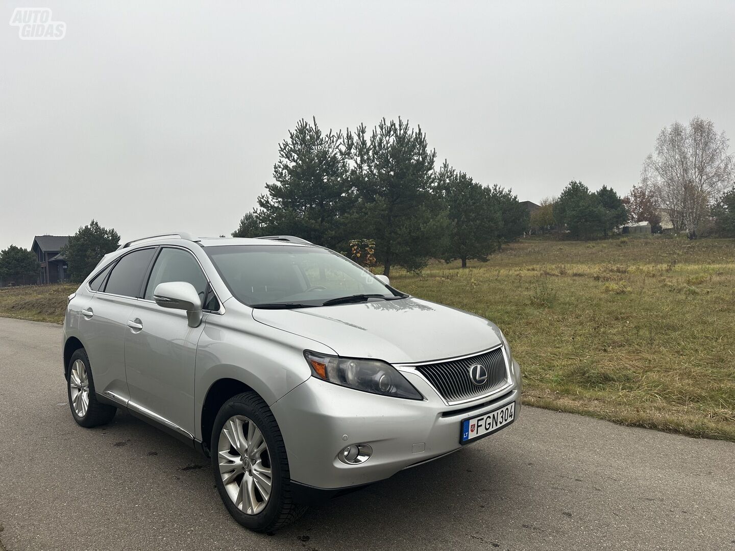 Lexus RX 450h III 2010 г