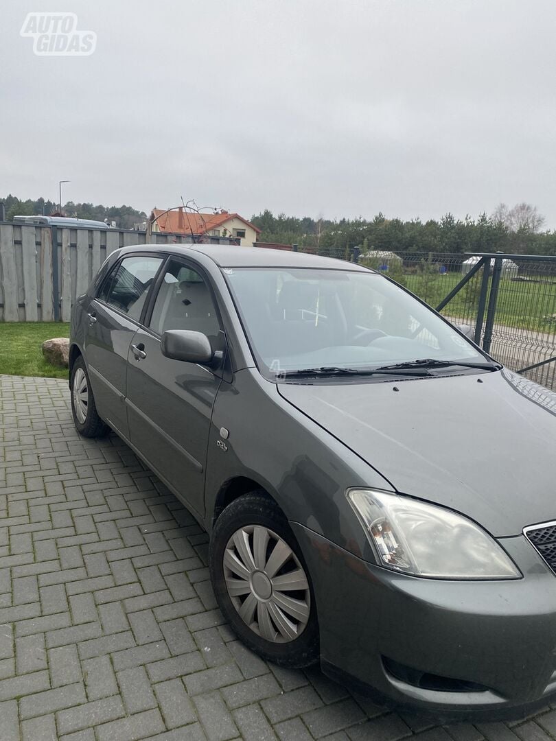 Toyota Corolla 2003 г Седан