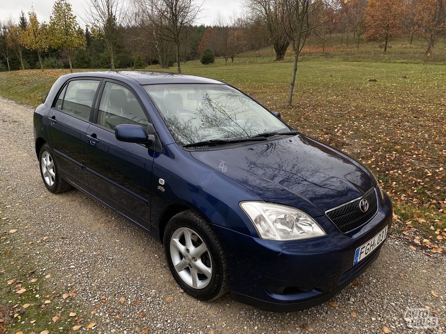 Toyota Corolla IX 2003 г