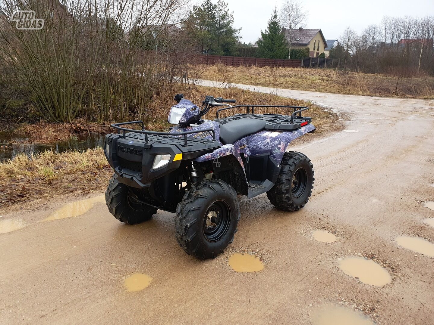 Polaris Sportsman 2010 г Четырех мотоцикл