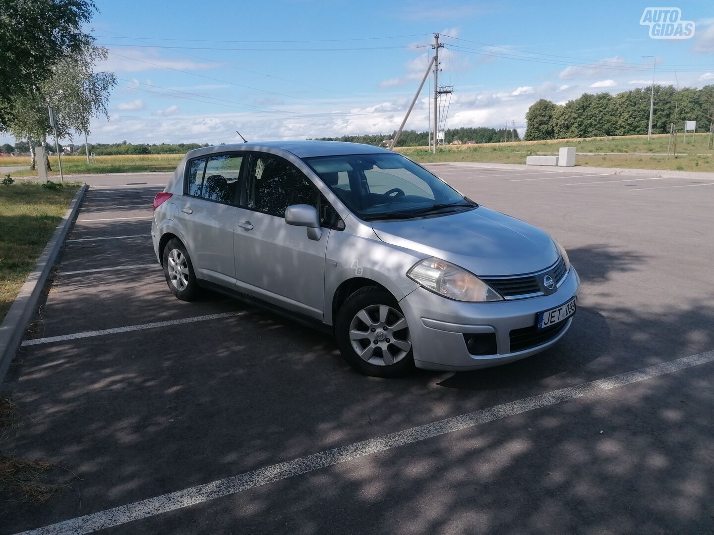 Nissan Tiida 2009 г Хэтчбек