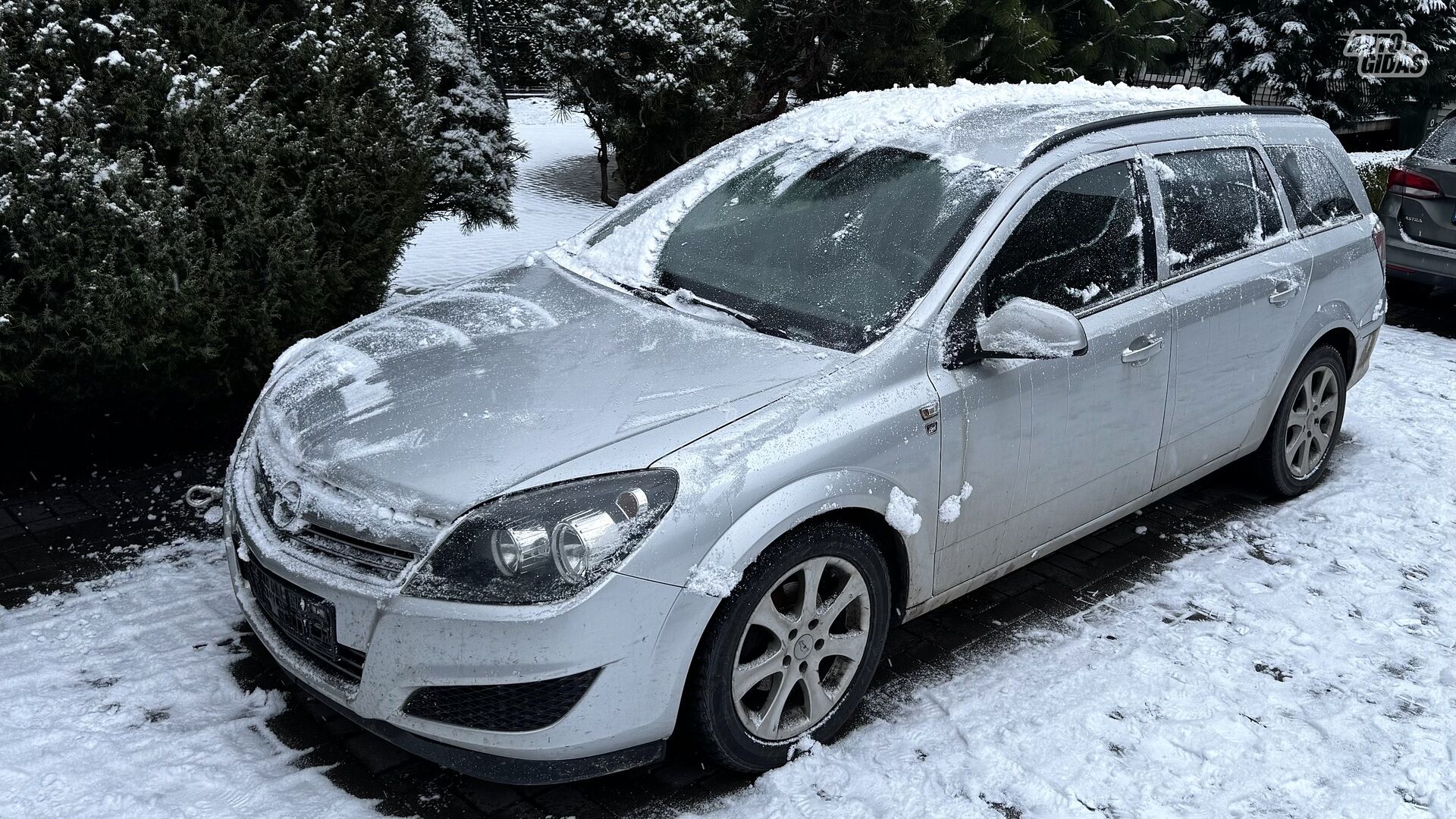 Opel Astra 2010 г Универсал