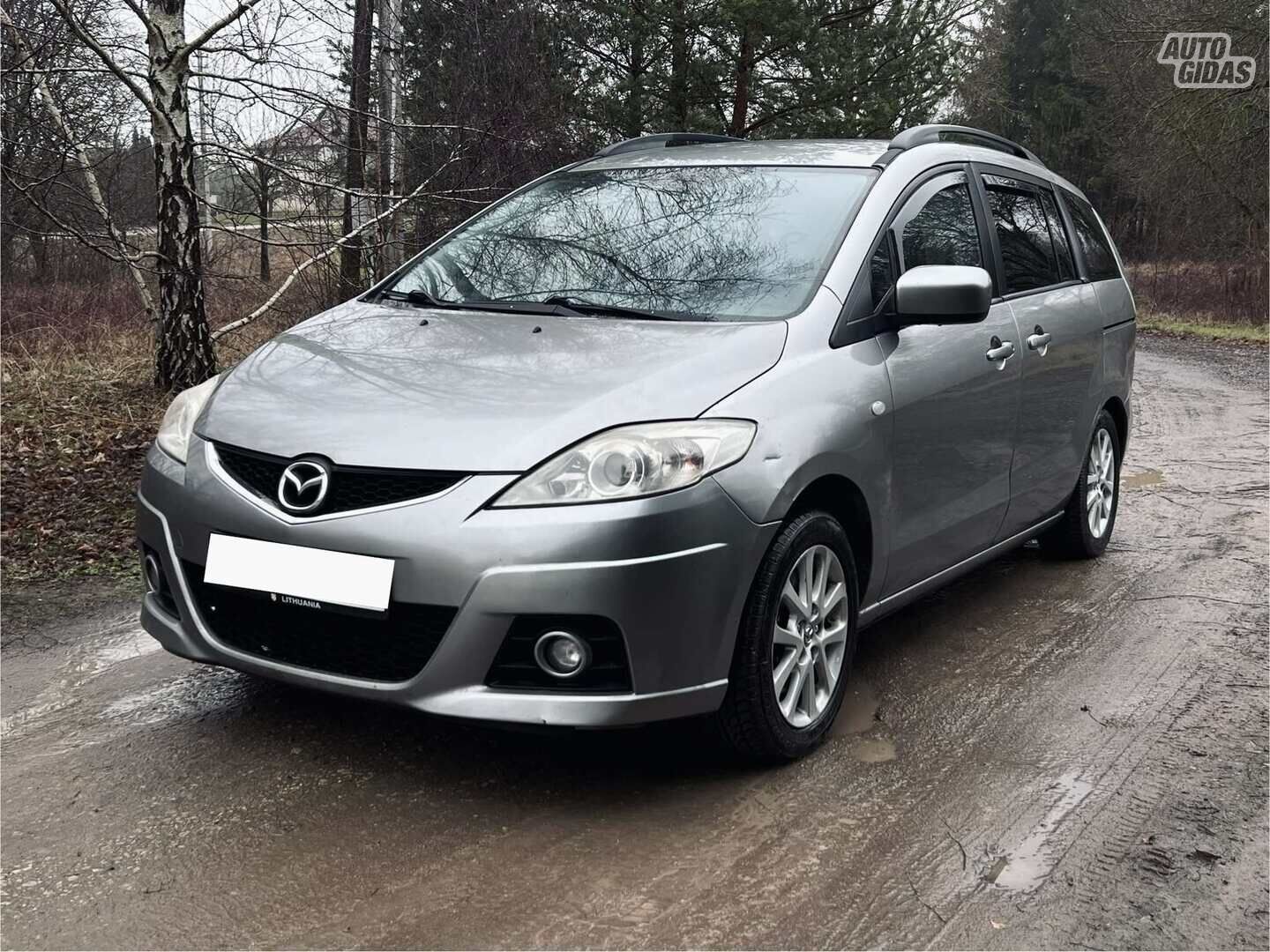 Mazda 5 2010 y Van