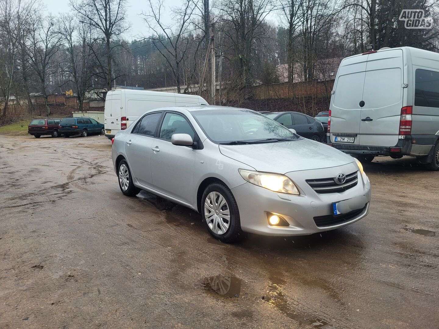 Toyota Corolla 2010 г Седан