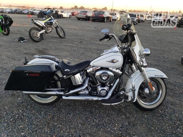 Harley-Davidson FLSTC 2013 г Чопер / Cruiser / Custom мотоцикл