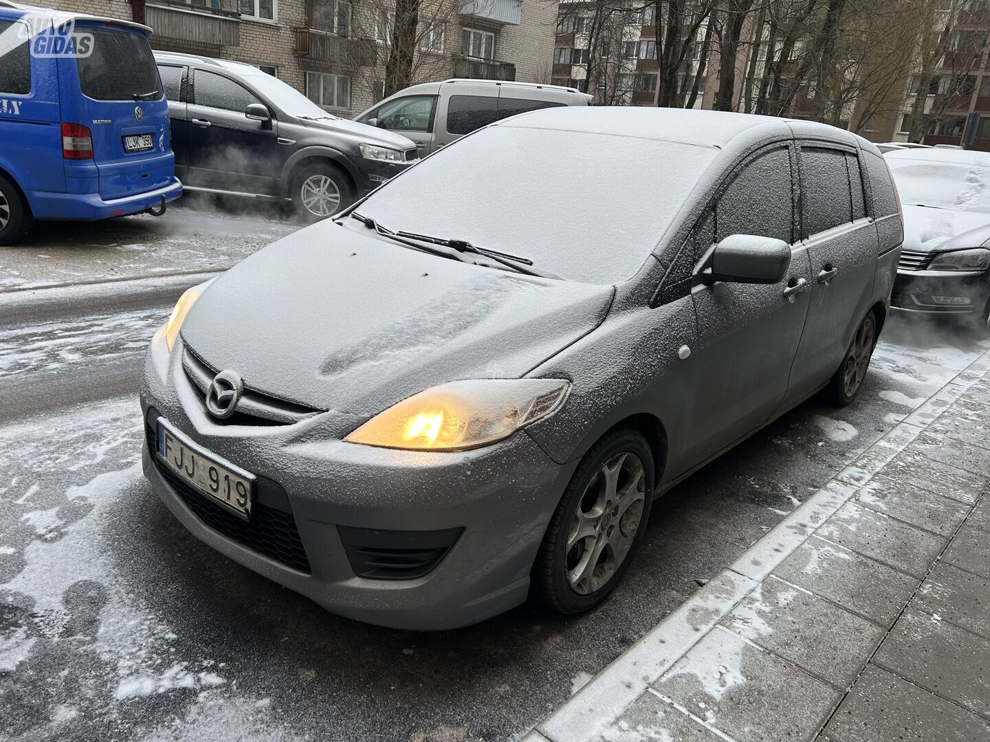 Mazda 5 2011 y Van