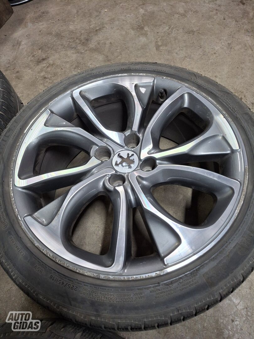 Peugeot light alloy R18 rims